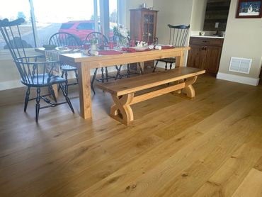 Solid oak dining table and bench with epoxy-filled knots.  Custom design and built. 