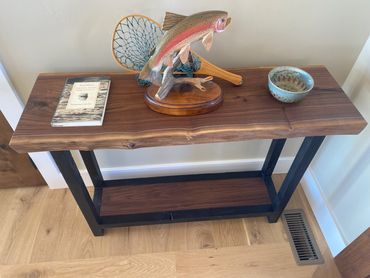 Entry Table made of live-edge walnut slab and reclaimed barnwood.