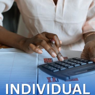 Person using calculator with notebook nearby.