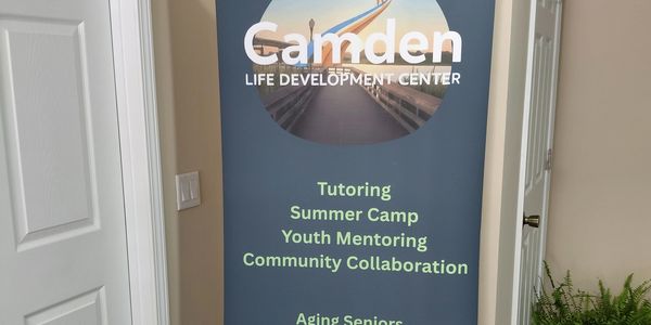 Banner for Camden Life Development Center and its services.