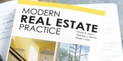Book titled 'Modern Real Estate Practice' with images of home interiors on the cover.