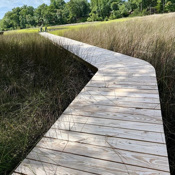 Upgraded waterfront dock in Hampstead, NC, improving access, durability, and property value.