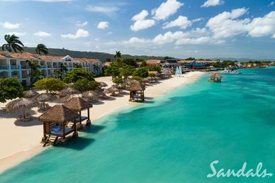 Sandals Montego Bay resort beach with private cabanas and oceanfront suites