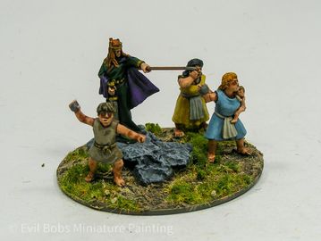 Painted miniatures depicting a medieval scene with a queen and villagers.