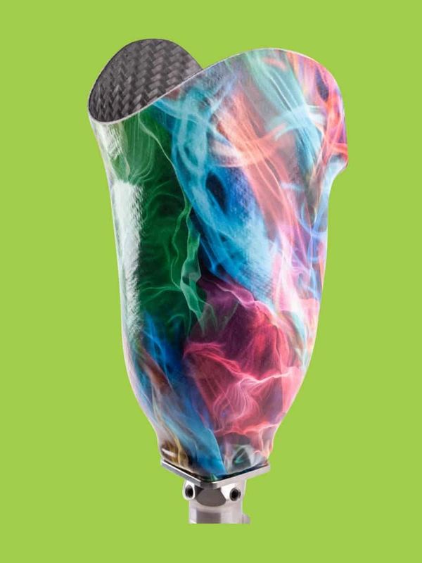 Colorful, artistic prosthetic leg socket with vibrant abstract patterns.