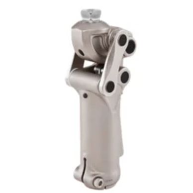 A metallic prosthetic knee joint component.
