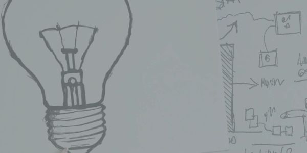Sketch of a light bulb with charts and notes on a wall.