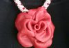 My signature hand made polymer clay rose. Zoom in for a close look!