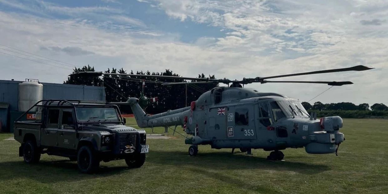 Signage for Hayward & Green 
Two Helicopters & Two Defenders