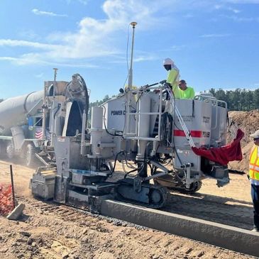 Curb Machine pouring curb 