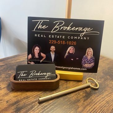 The Brokerage Real Estate Company card on the display