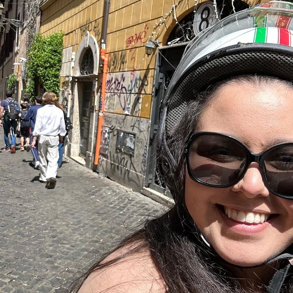 Sarah DiPiazza, Travel Advisor & Concierge, on a vespa tour in Rome Italy with Scooteroma Tours