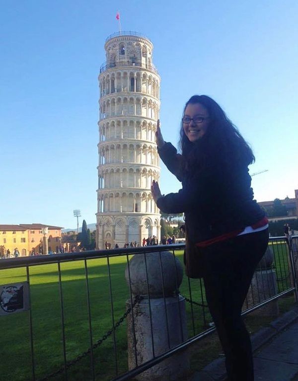 Sarah DiPiazza, Colfax, WI Based Travel Advisor & Concierge - in front of the Leaning Tower of Pisa in Italy - January 2016