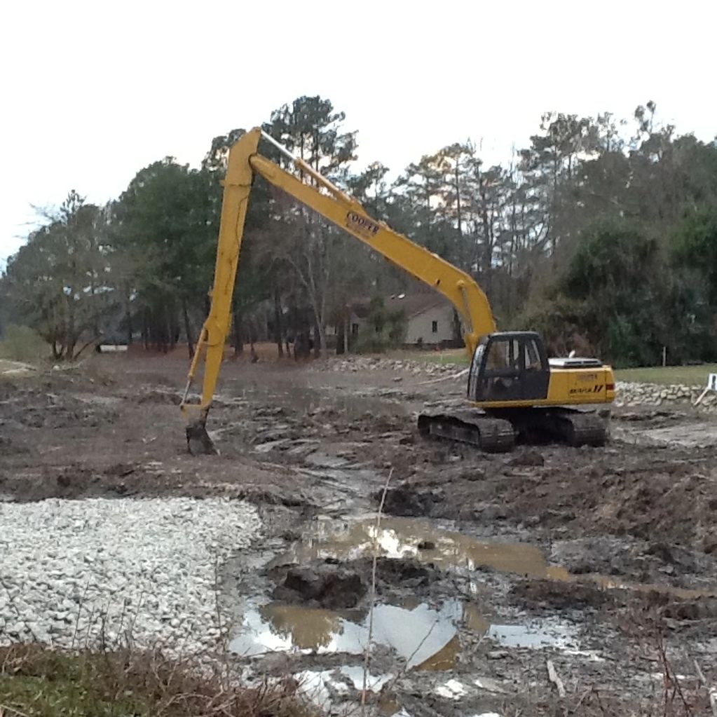 In essence, mechanical dredging is the act of using a dredge that digs materials from an extraction 