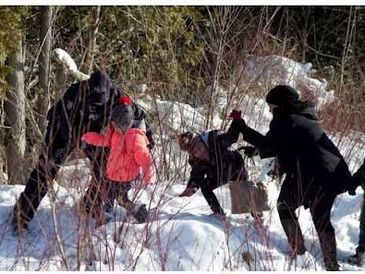 A snowy Canada–U.S. border area in Quebec where Haitian migrants were detained on Christmas night.