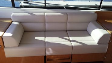 Luxury hand-made marine upholstery on a yacht.