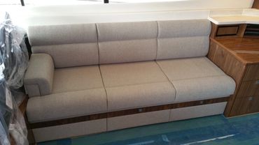Luxury hand-made marine upholstery on a yacht.