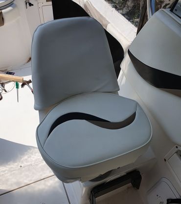 hand-made marine seat cover on a yacht.