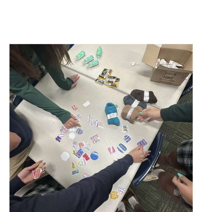 Making care bags for the patients of Oakland Macomb Cancer Specialists Center!