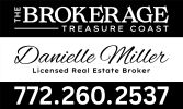 Real estate broker business card with contact details.