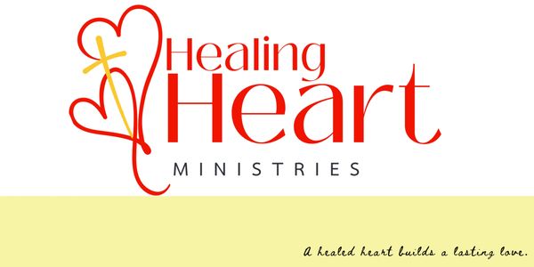 Logo of Healing Heart Ministries with a cross and hearts.