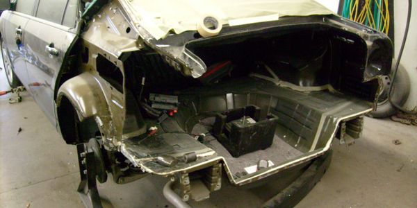 Repair of the rear floor and body panel. 