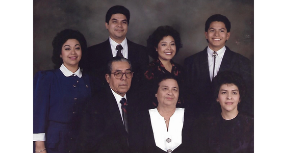 Mr. and Mrs. Martinez with their five children. 
