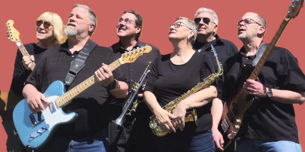A six-member band posing with their instruments against a red background.
