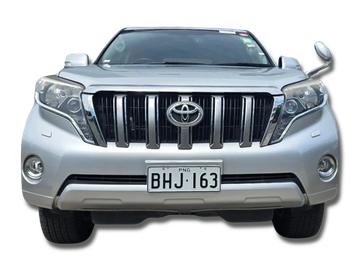 Front view of a silver Toyota SUV with license plate BHJ-163.