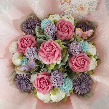 A beautiful bouquet of colorful flowers with butterflies.