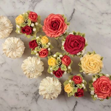 Cupcakes decorated with buttercream in red, orange and yellow