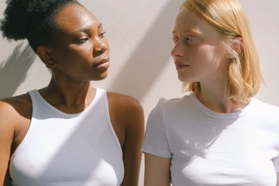 Black woman and White woman looking at each other