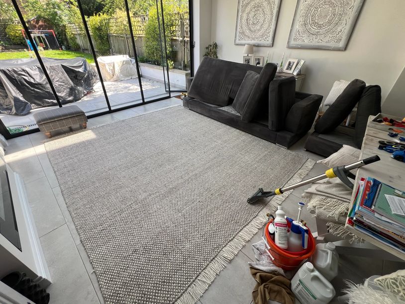 Professional carpet cleaning equipment in the sitting room in Putney.
