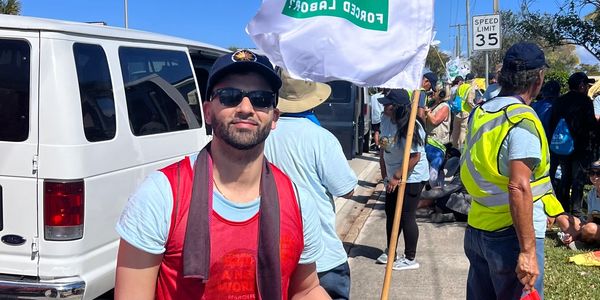 Che Guerrero RevolutionTV Creator at Protest