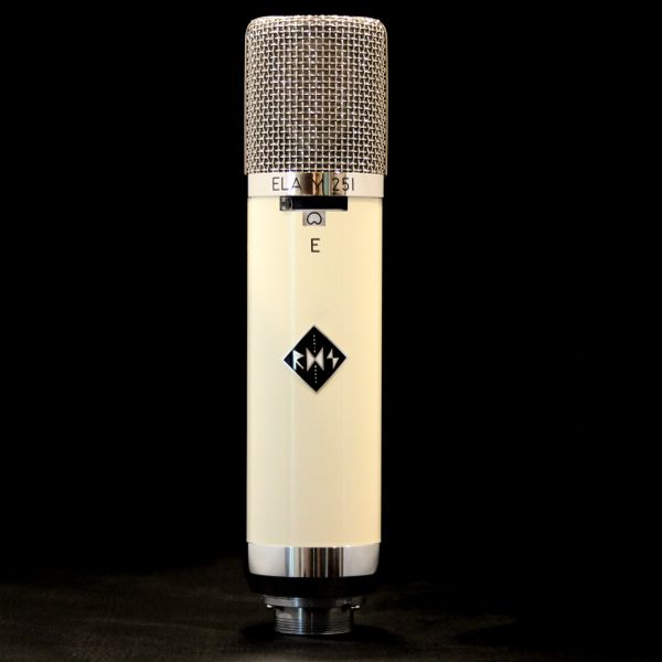 Vintage cream-colored studio microphone with silver mesh grille.