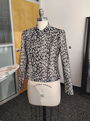 Professional suits arranged in a retail store