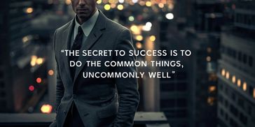 Man in suit with motivational success quote against city lights.