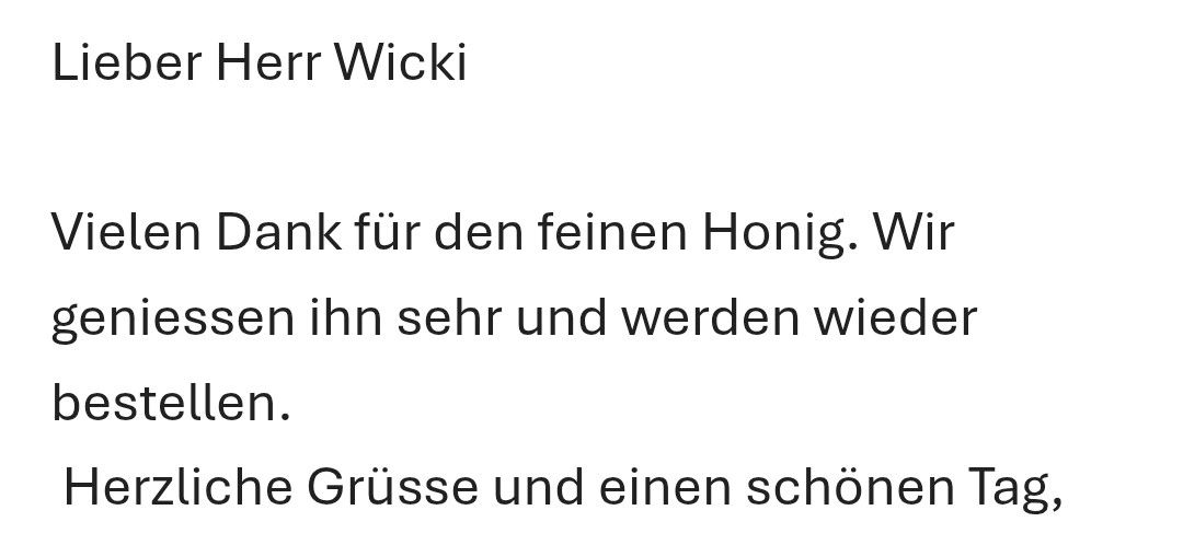 A thank you note in German appreciating fine honey and expressing intent to reorder.