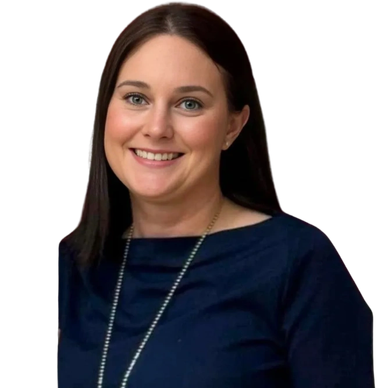 Smiling woman with dark hair and a navy blue top.