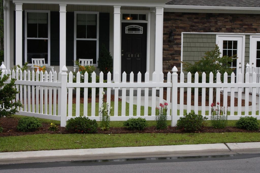 This is a decorative white vinyl 3' high Chelsea style fence with spade pickets and gothic post