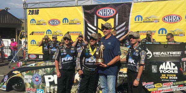 Art Tucker with NHRA Legend John Force after his 2018 win at Mile High Nationals