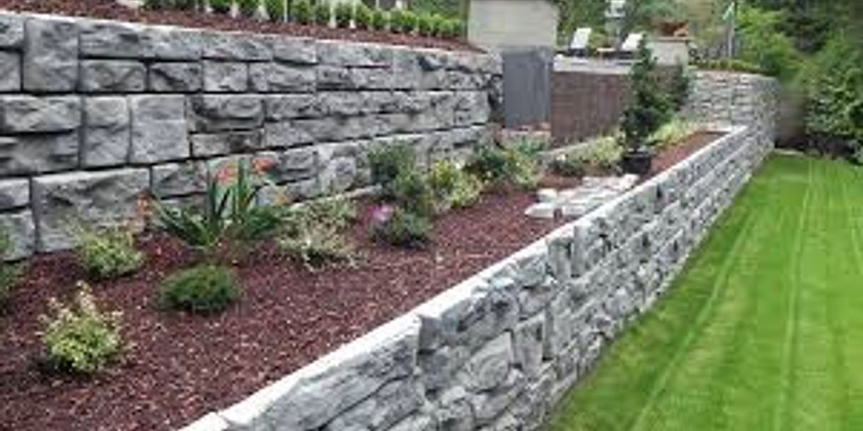 Retaining wall with flower bed