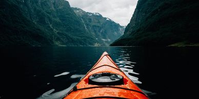kayak heading into fjords