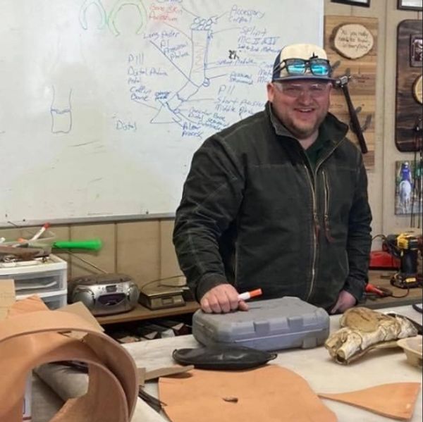 Teddy Franke teaching in front of the classroom.