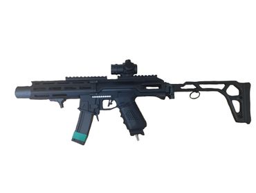 Black airsoft gun with a scope and teal tape on the magazine.