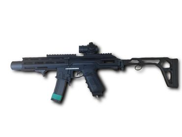 Black airsoft gun with a foldable stock and mounted red dot sight.