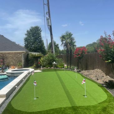 6 hole putting green customized for area behind pool