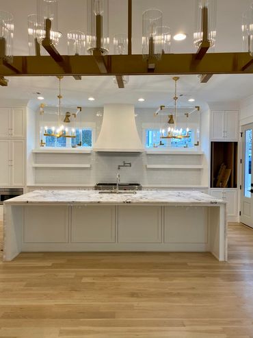Romabio Marmorino Plaster. Decorative plaster kitchen hood in Alpharetta. Lehigh Homes