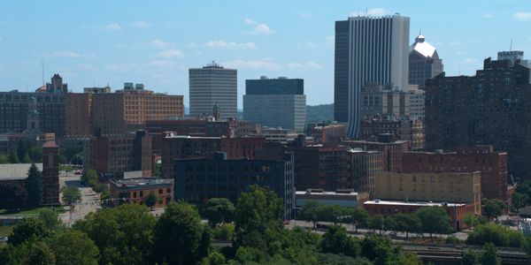 an aerial view of city skyscrapers