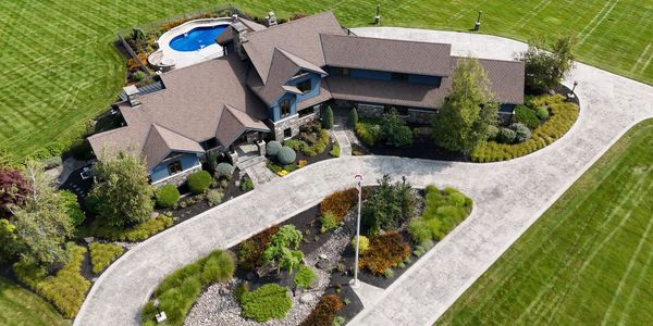 an aerial view of a luxurious home in rural New York. 